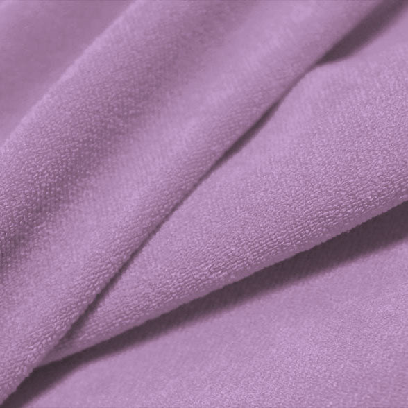 A folded piece of Cozy Polyester Spandex Terry Cloth in the color bright lilac.