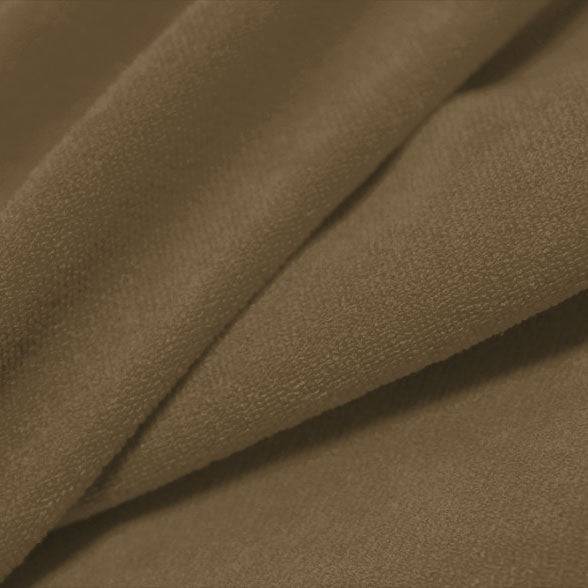 A folded piece of Cozy Polyester Spandex Terry Cloth in the color dust.