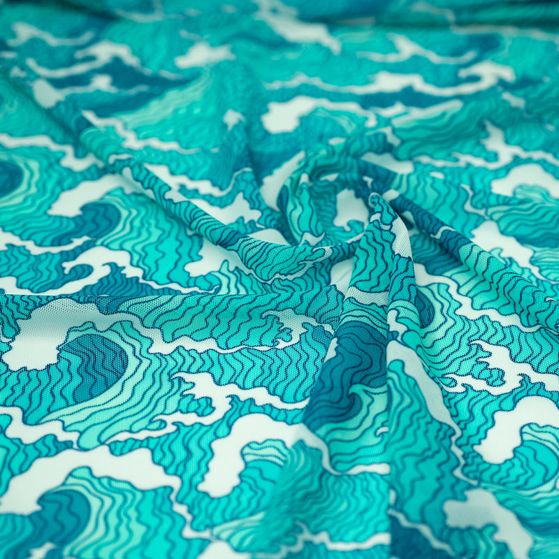 A swirled piece of Crazy Waves Printed Power Mesh