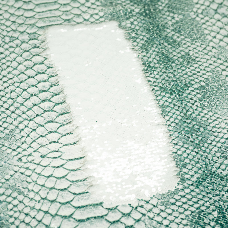 A flat sample of Crocodile Printed Flip Sequin on Spandex in the color white-green