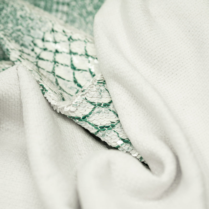 Detailed shot of Crocodile Printed Flip Sequin on Spandex in the color white-green