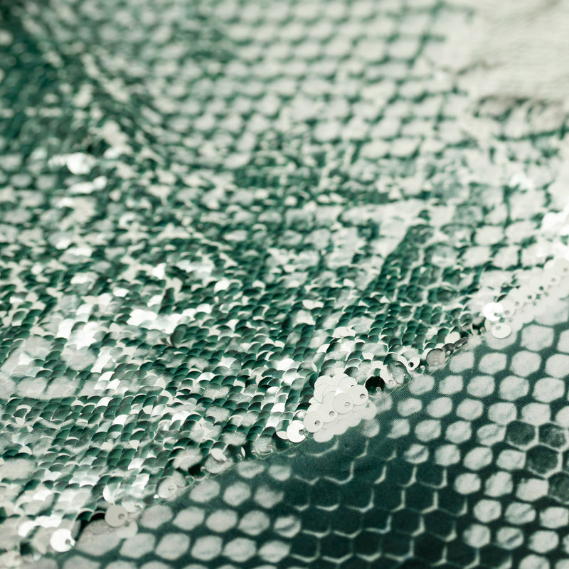 Detailed shot of Crocodile Printed Flip Sequin on Spandex in the color white-green