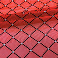 A folded piece of Diamonds Flocked Stretch Mesh in the color Red-Black-Silver