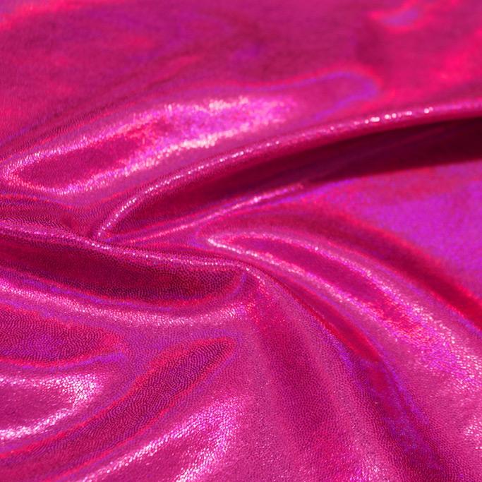 A swirled sample of dizzy foiled spandex in the color berry-fuchsia.