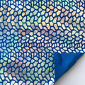 A flat sample of dragon scales holographic spandex sequin in the color royal.