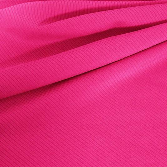 A draped sample of double ribbed spandex in the color fuchsia.