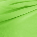 A draped sample of double ribbed spandex in the color lime.