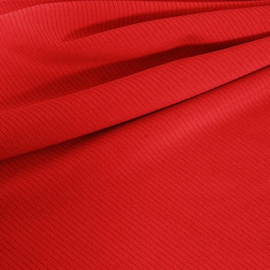 A draped sample of double ribbed spandex in the color red.