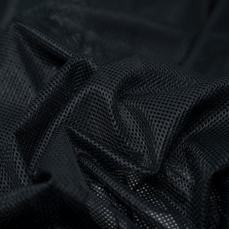 A crumpled piece of Polyester Mesh Tricot Boardshort and Swim Trunk Lining in the color Black