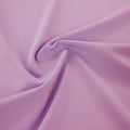 A swirled sample of ecotechflex recycled polyester spandex in the color orchid.