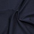 A swirled sample of ecodelish double peached heather recycled polyester spandex fabric in the color midnight.