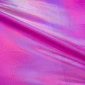 A flat sample of electric foiled spandex in the color fuchsia.