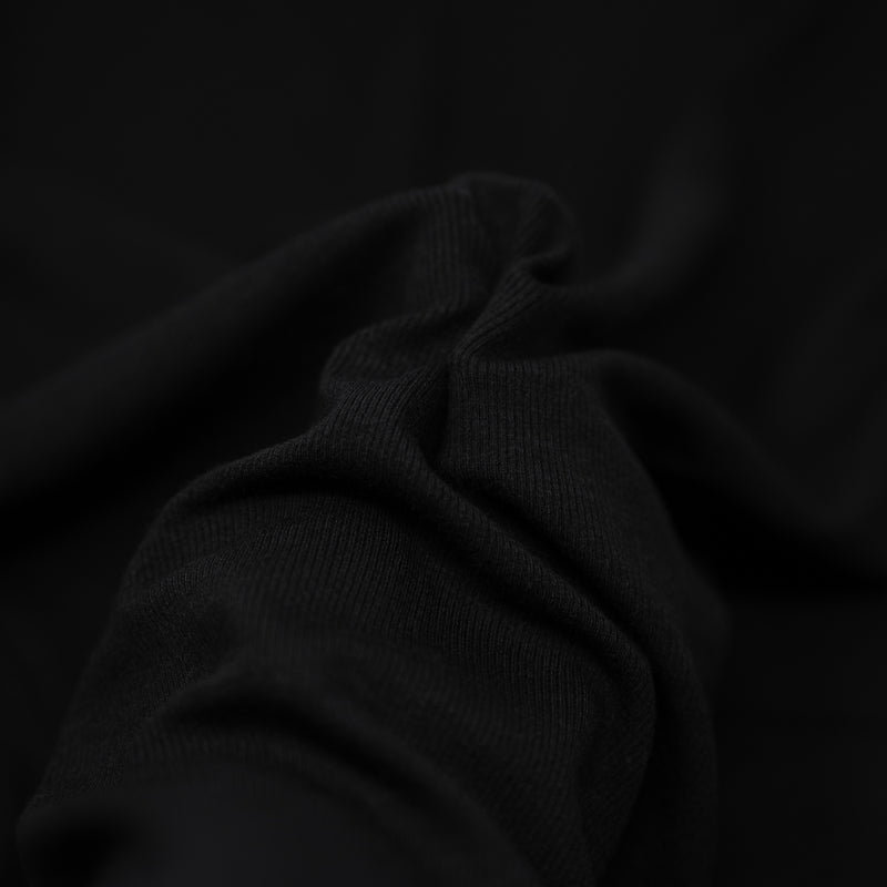 Detailed photograph of Embody Tencel Lyocell Spandex Rib Jersey in the color black