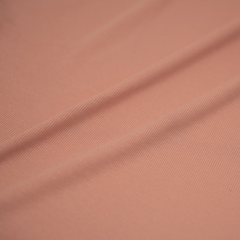 A sample of Embody Tencel Lyocell Spandex Rib Jersey in the color Rosy-Peach