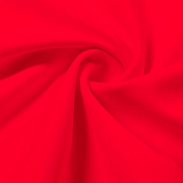 A swirled piece of Energize Activewear Nylon Spandex in the color candy apple.