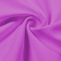 A swirled piece of Energize Activewear Nylon Spandex in the color festival.