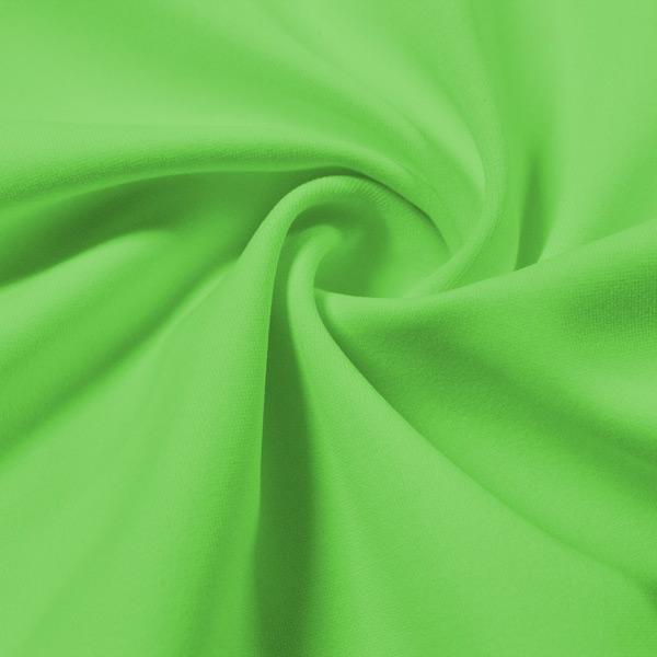 A swirled piece of Energize Activewear Nylon Spandex in the color fresh.