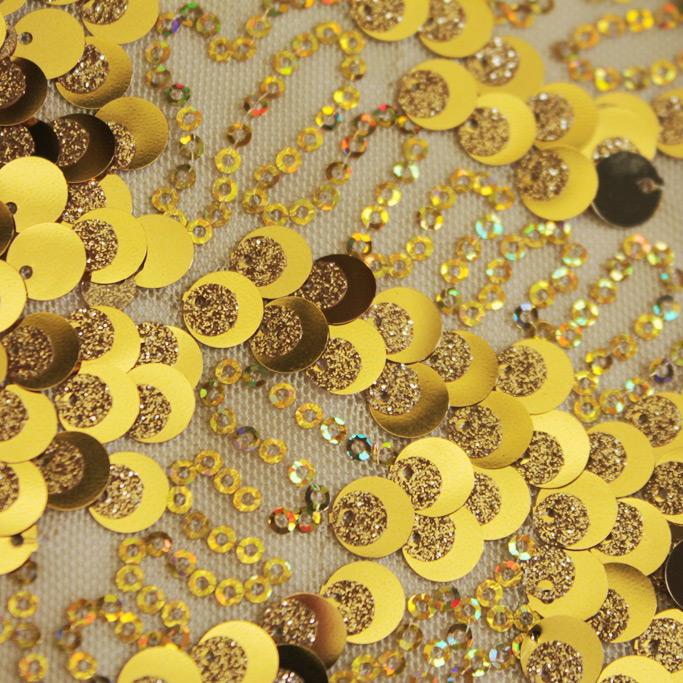 Detailed shot of Fame Stretch Mesh Sequin in color Gold.