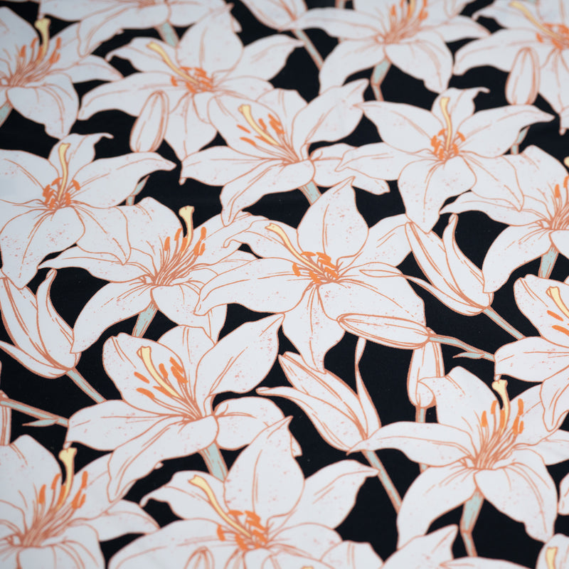 Detailed shot of Field of White Lilies Printed Spandex.