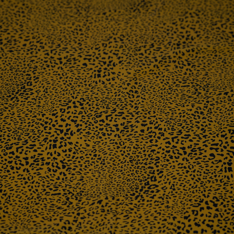 Detailed shot of Finely Spotted Cheetah Printed Spandex.