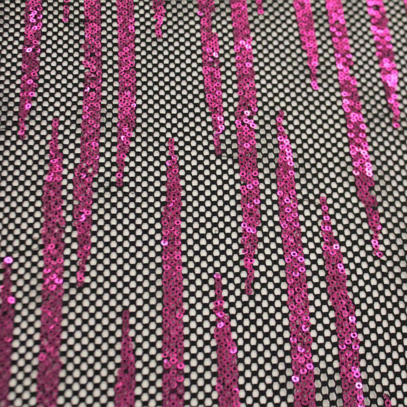 A flat sample of flair stretch mesh sequin in the color black-fuchsia.