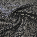 Flipside Activewear Spandex with a Matte Silver Foil Print of Scattered Spots in the color charcoal.