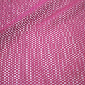 A flat sample of forte flair mesh in the color magenta.