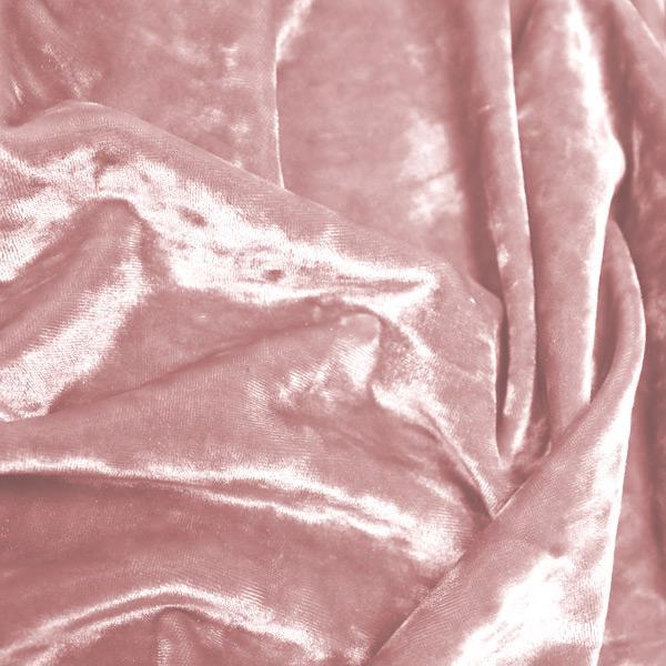 A crumpled pieces of Frozen Crushed Stretch Velvet in the color rosy peach