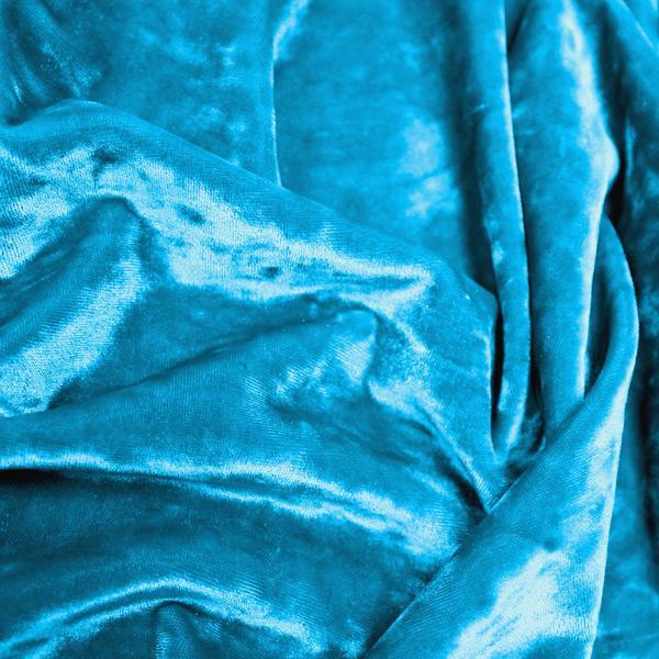 A crumpled pieces of Frozen Crushed Stretch Velvet in the color turquoise