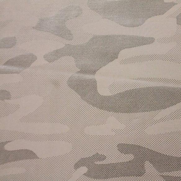 A flat sample of gi jane foil printed superflex in the color pewter gray.