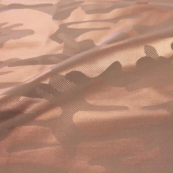A flat sample of gi jane foil printed superflex in the color toasted-rose gold.