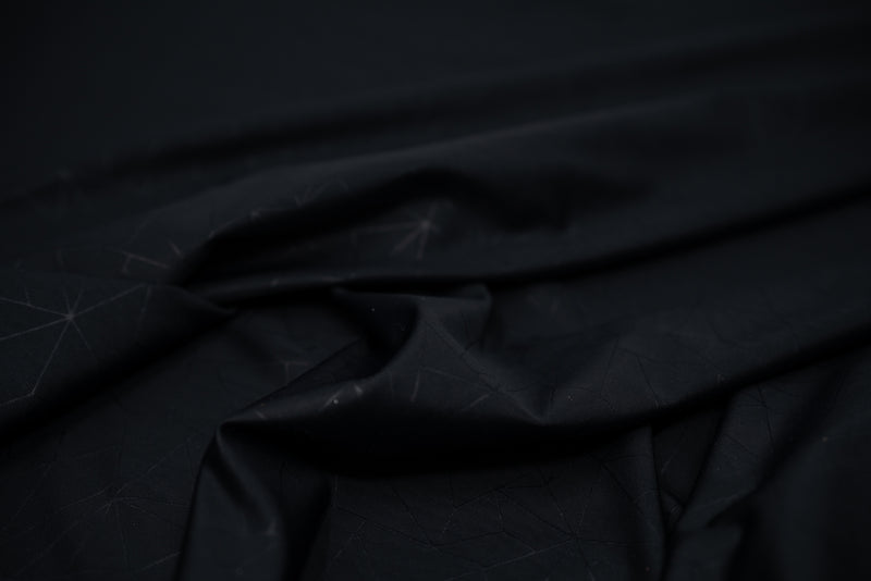 Detailed shot of Geometric Embossed Matte Spandex Tricot in Black.