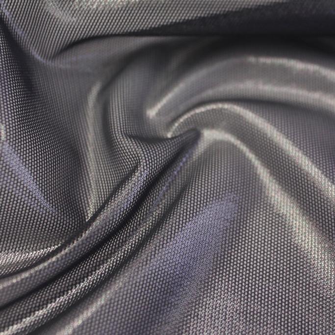 A swirled sample of glaze foiled stretch mesh in the color gunmetal.