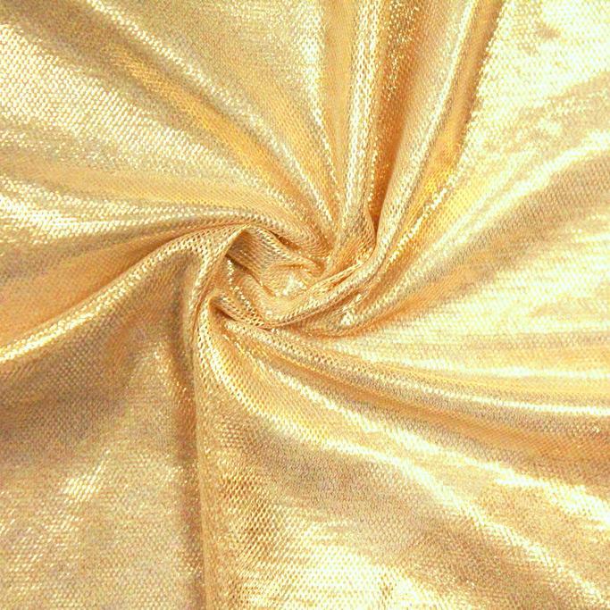 A swirled sample of goddess foiled strtch mesh in the color nude-gold.