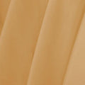 A flat sample of delite nylon spandex in the color naked.