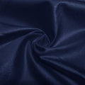 A swirled piece of nylon spandex fabric with an all over shiny look in the color navy blue.