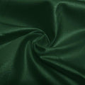 A swirled piece of nylon spandex fabric with an all over shiny look in the color sequoia.