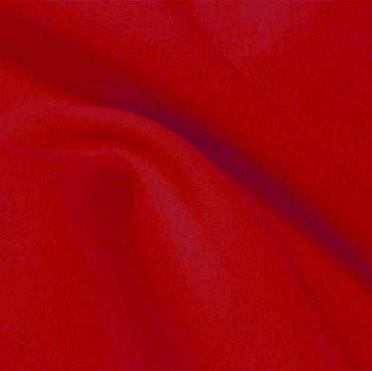 A flat sample of flexfilt recycled polyester spandex in the color classic car red.
