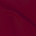 A flat sample of flexfilt recycled polyester spandex in the color ebi burgundy.