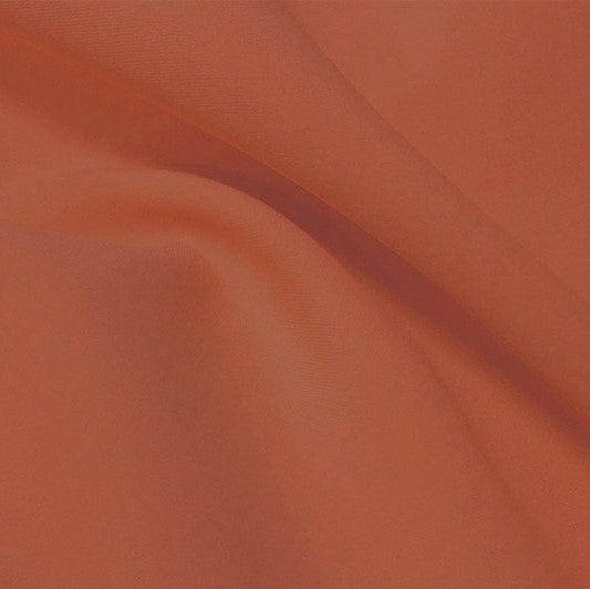 A flat sample of flexfit recycled polyester spandex in the color pale copper.