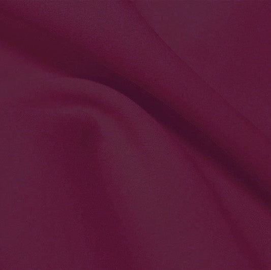 A flat sample of flexfilt recycled polyester spandex in the color purple plum.