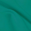 A flat sample of flexfilt recycled polyester spandex in the color totally teal.