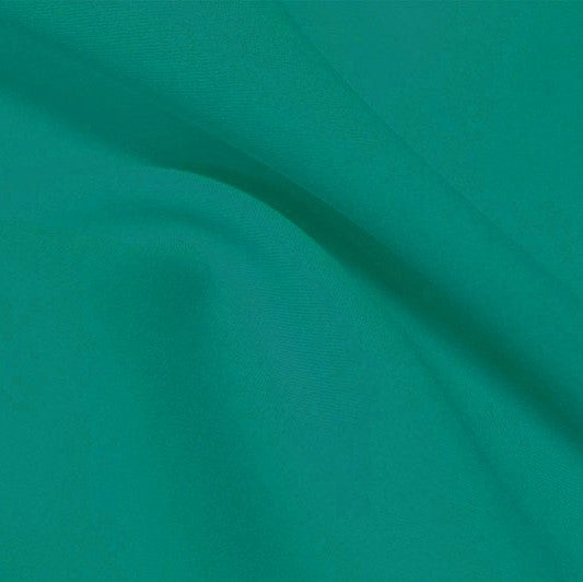 A flat sample of flexfilt recycled polyester spandex in the color totally teal.