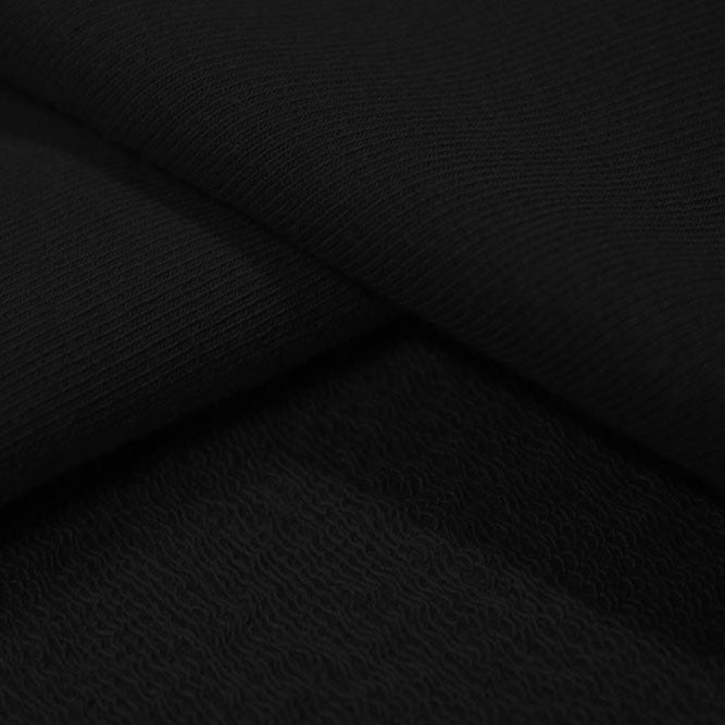A sample of Balance Cotton Modal Terry Spandex Fabric in the color black