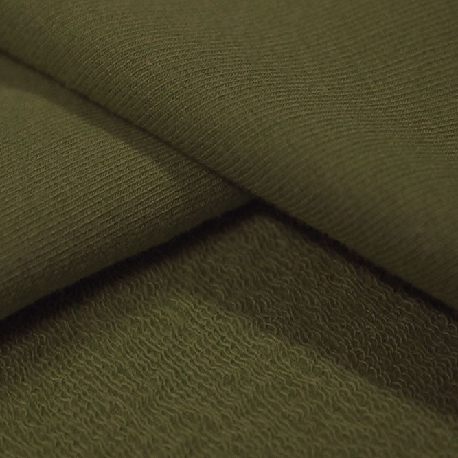 A sample of Balance Cotton Modal Terry Spandex Fabric in the color dusty olive
