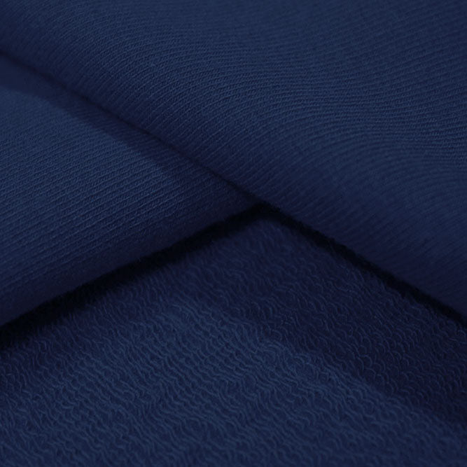 A sample of Balance Cotton Modal Terry Spandex Fabric in the color navy