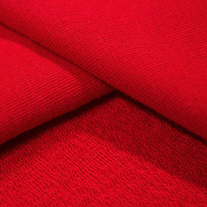 A sample of Balance Cotton Modal Terry Spandex Fabric in the color Red