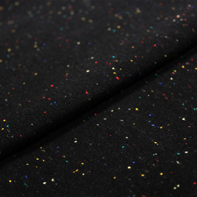 A sample of Speckle Cotton Polyester Modal Terry Spandex Fabric in the color Black / Multi