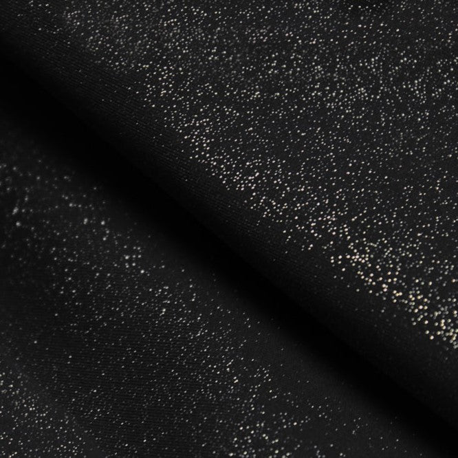 A flat sample of glitz shiny spandex in the color black/silver.