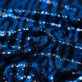 Close up detail of Heidi Zebra Spandex Sequin in Black and Blue.